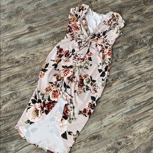 Fitted high low floral dress .